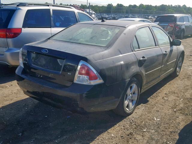 3FAHP07Z28R147215 - 2008 FORD FUSION SE BLACK photo 4