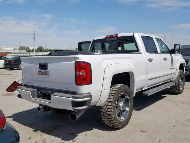 1GT42WEY7KF138518 - 2019 GMC SIERRA K35 WHITE photo 4