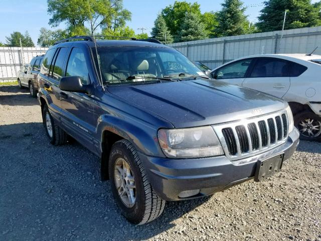 1J4GW48N22C289740 - 2002 JEEP GRAND CHER GRAY photo 1