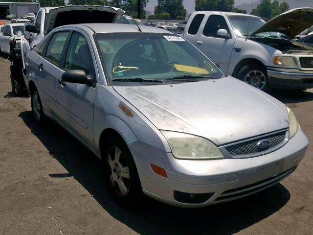 1FAFP34N05W183293 - 2005 FORD FOCUS ZX4 SILVER photo 1