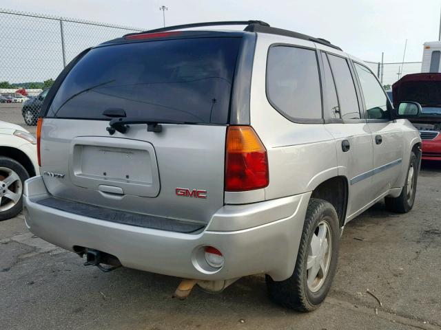 1GKDS13S572202396 - 2007 GMC ENVOY SILVER photo 4