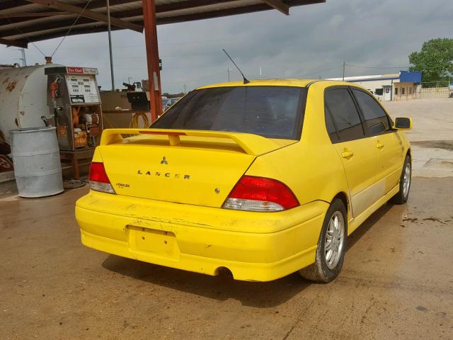 JA3AJ86E02U012971 - 2002 MITSUBISHI LANCER OZ YELLOW photo 4