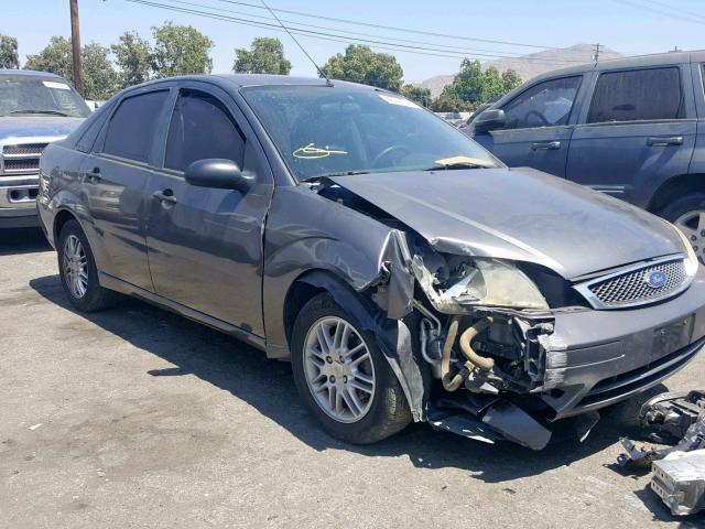 1FAHP34N26W148295 - 2006 FORD FOCUS ZX4 GRAY photo 1