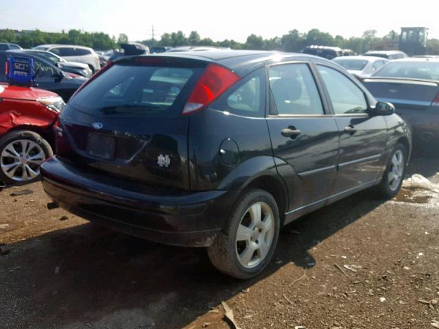 1FAHP37N67W150144 - 2007 FORD FOCUS ZX5 BLACK photo 4