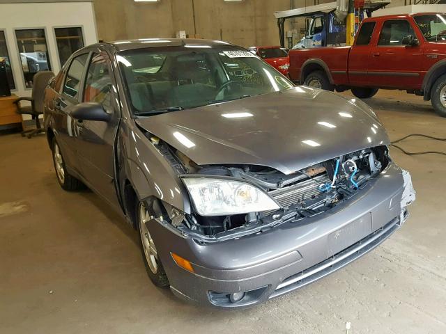 1FAHP34N37W234863 - 2007 FORD FOCUS ZX4 GRAY photo 1