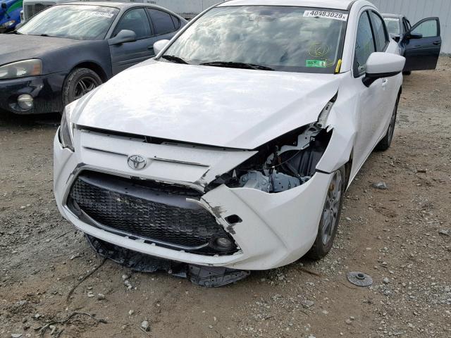 3MYDLBYV9KY513438 - 2019 TOYOTA YARIS L WHITE photo 9