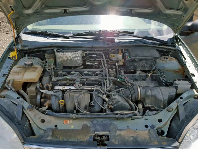 1FAFP34N35W154659 - 2005 FORD FOCUS ZX4 GREEN photo 7