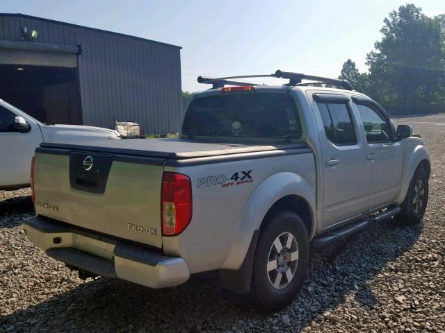 1N6AD0EV4AC427031 - 2010 NISSAN FRONTIER C SILVER photo 4