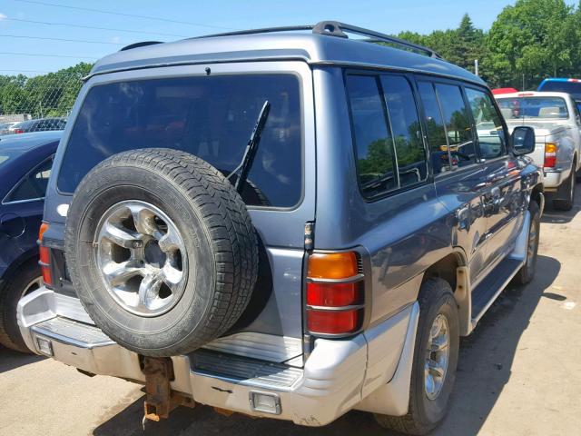 JA4MR51R5XJ003332 - 1999 MITSUBISHI MONTERO GRAY photo 4