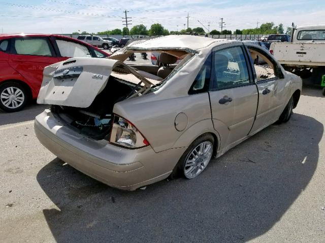 1FAFP34N06W151669 - 2006 FORD FOCUS ZX4 GOLD photo 4