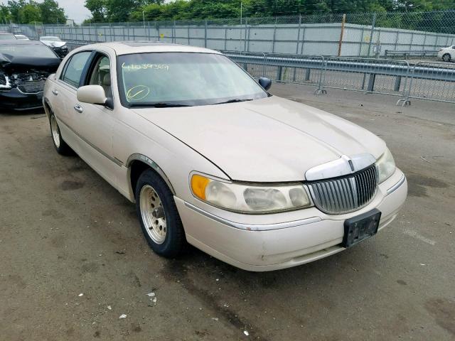 1LNHM83W8XY625873 - 1999 LINCOLN TOWN CAR C TAN photo 1