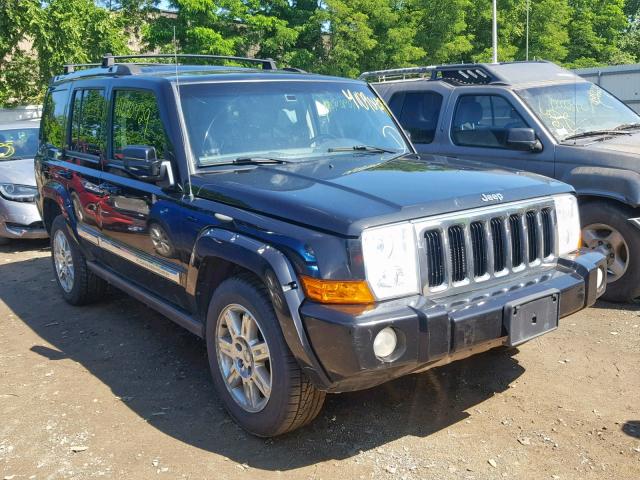 1J4RG5GT7AC109338 - 2010 JEEP COMMANDER BLACK photo 1