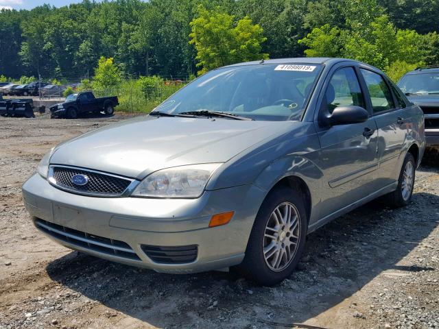 1FAFP34N75W185686 - 2005 FORD FOCUS ZX4 GREEN photo 2