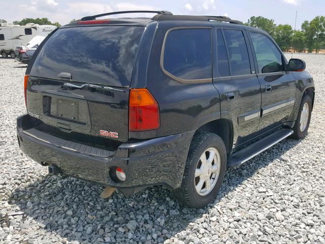 1GKDS13S942396619 - 2004 GMC ENVOY BLACK photo 4