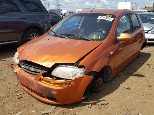 KL1TD66626B588178 - 2006 CHEVROLET AVEO BASE Narıncı foto 2