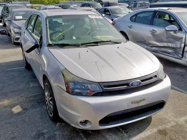 1FAHP3GN8AW257459 - 2010 FORD FOCUS SES SILVER photo 1