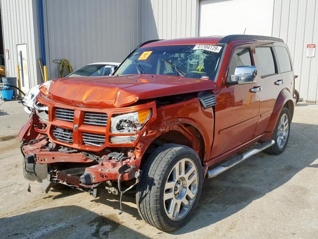 1D8GU58697W630469 - 2007 DODGE NITRO R/T ORANGE photo 2