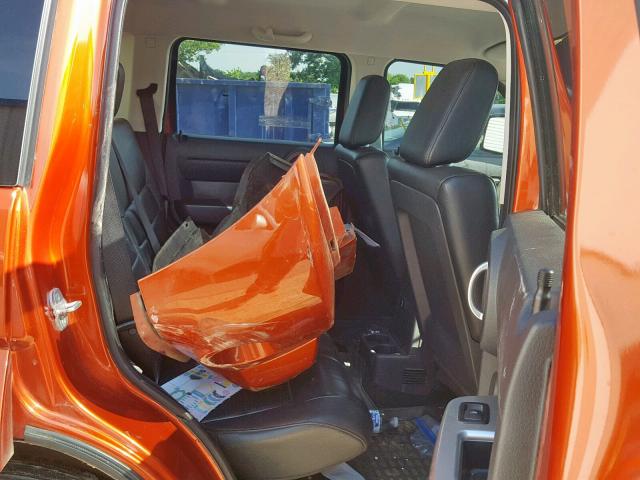 1D8GU58697W630469 - 2007 DODGE NITRO R/T ORANGE photo 6