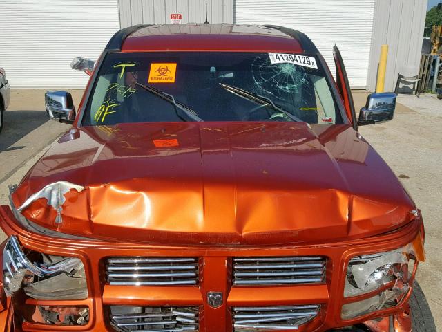 1D8GU58697W630469 - 2007 DODGE NITRO R/T ORANGE photo 7