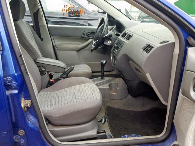 1FAFP34N35W205724 - 2005 FORD FOCUS ZX4 BLUE photo 5