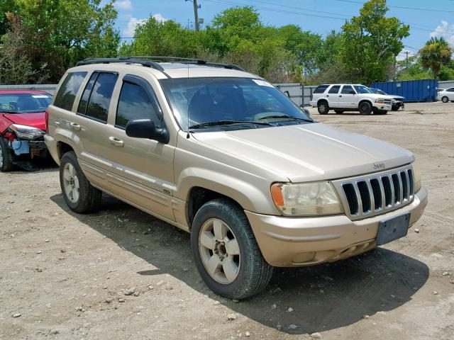 1J4GX58N31C737761 - 2001 JEEP GRAND CHER GOLD photo 1