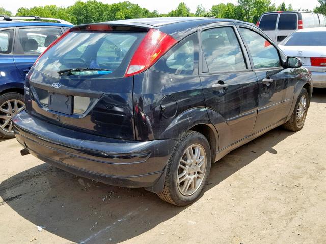 1FAFP37N57W282626 - 2007 FORD FOCUS ZX5 BLACK photo 4