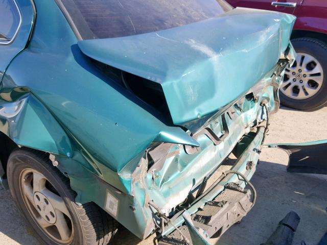 1G2NE52T1XC531488 - 1999 PONTIAC GRAND AM S GREEN photo 9