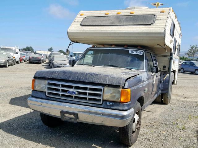 1FTJX35G2KKB63151 - 1989 FORD F350 BLUE photo 2