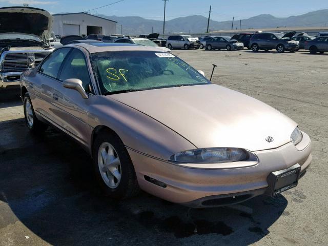 1G3GR62CXX4107896 - 1999 OLDSMOBILE AURORA TAN photo 1