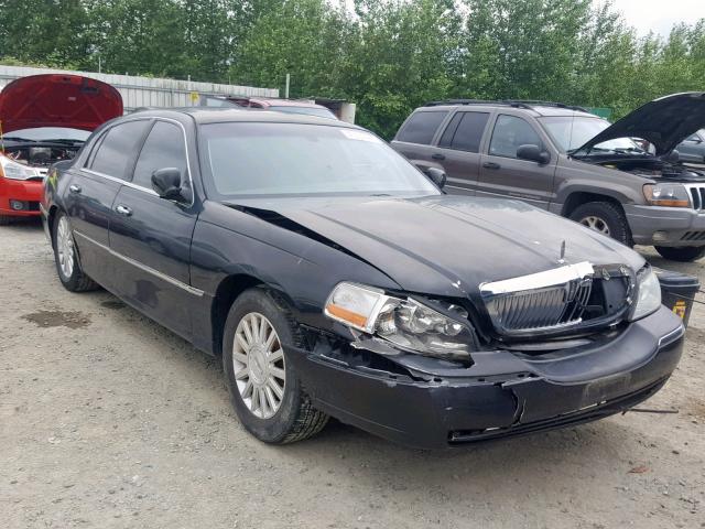 1LNHM81W34Y625455 - 2004 LINCOLN TOWN CAR E BLACK photo 1