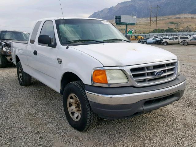 2FTPX18Z14CA69877 - 2004 FORD F-150 HERI WHITE photo 1