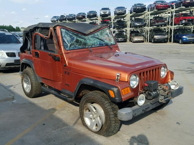 1J4FA39S62P708089 - 2002 JEEP WRANGLER / ORANGE photo 1