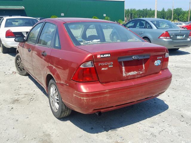 1FAFP34N35W137828 - 2005 FORD FOCUS ZX4 RED photo 3