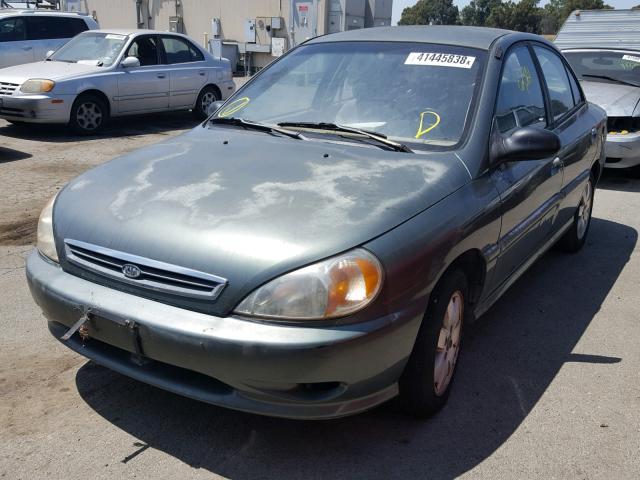 KNADC123816076423 - 2001 KIA RIO GREEN photo 2