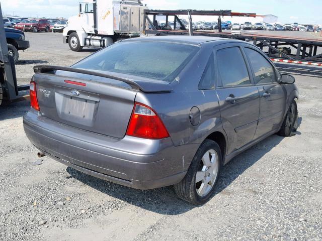 1FAFP34N27W362969 - 2007 FORD FOCUS ZX4 GRAY photo 4