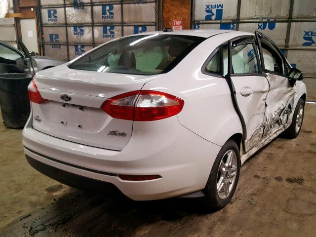 3FADP4BJ6JM111585 - 2018 FORD FIESTA SE WHITE photo 4