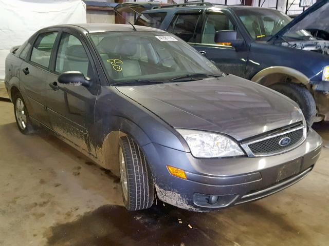 1FAHP34N17W244517 - 2007 FORD FOCUS ZX4 GRAY photo 1