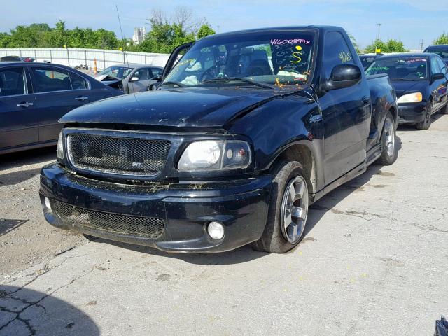 2FTRF07344CA61551 - 2004 FORD F150 SVT L BLACK photo 2