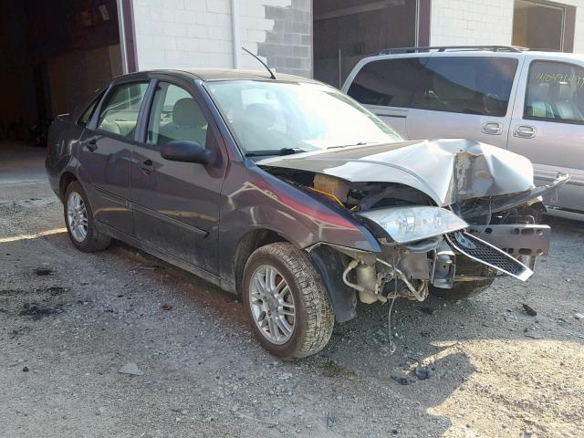 1FAFP34N27W250592 - 2007 FORD FOCUS ZX4 GRAY photo 1