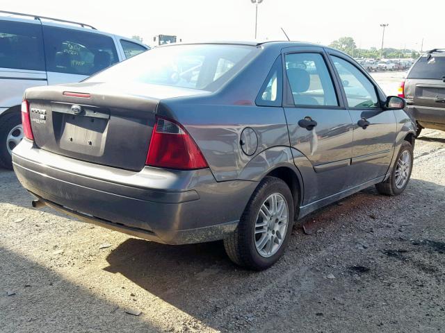 1FAFP34N27W250592 - 2007 FORD FOCUS ZX4 GRAY photo 4