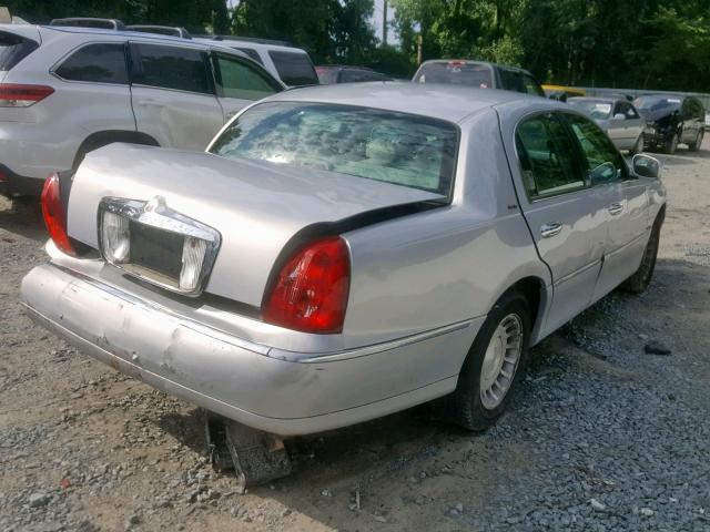 1LNHM81WX2Y649328 - 2002 LINCOLN TOWN CAR E SILVER photo 4