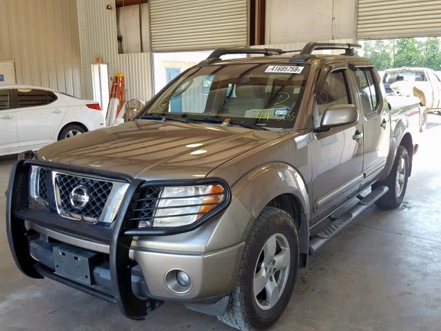 1N6AD07W36C444285 - 2006 NISSAN FRONTIER C TAN photo 1