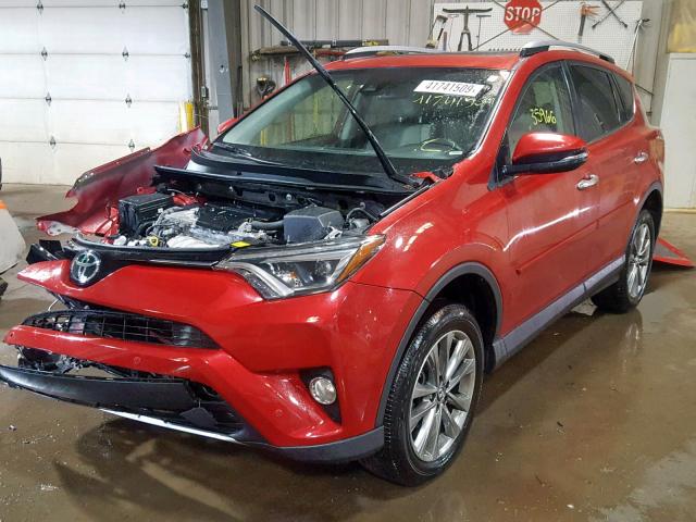 JTMDFREV6HJ146675 - 2017 TOYOTA RAV4 LIMIT RED photo 2