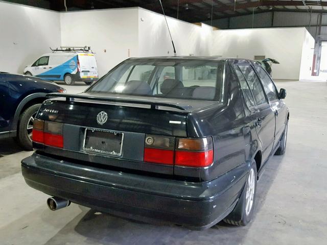 3VWPB81H5XM228365 - 1999 VOLKSWAGEN JETTA WOLF BLACK photo 4