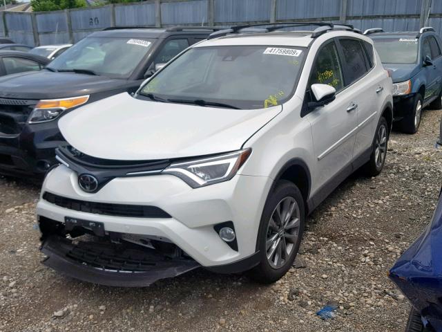 JTMDFREV4JJ204210 - 2018 TOYOTA RAV4 LIMIT WHITE photo 2