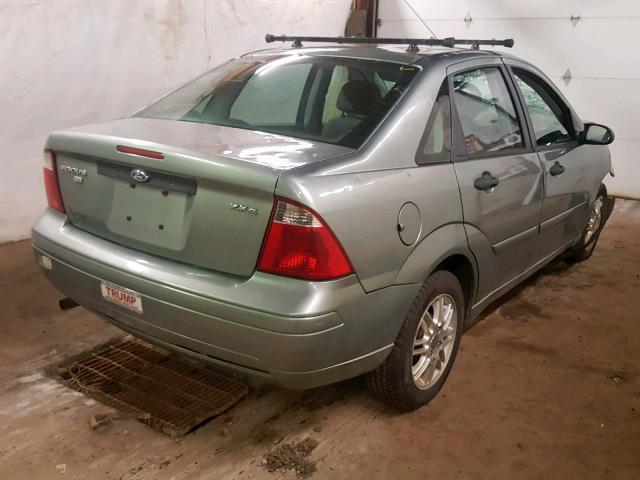 1FAFP34N16W188052 - 2006 FORD FOCUS ZX4 GREEN photo 4