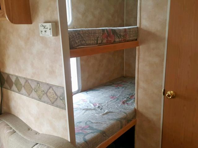 4YDT27B2737306636 - 2003 KEYSTONE HORNET WHITE photo 7