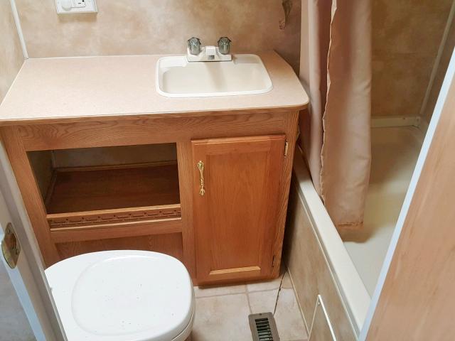 4YDT27B2737306636 - 2003 KEYSTONE HORNET WHITE photo 9