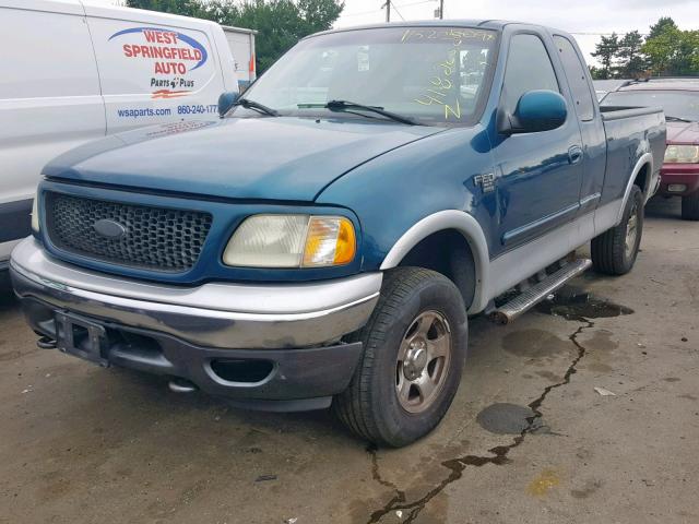 1FTRX18L7YNB79420 - 2000 FORD F150 BLUE photo 2