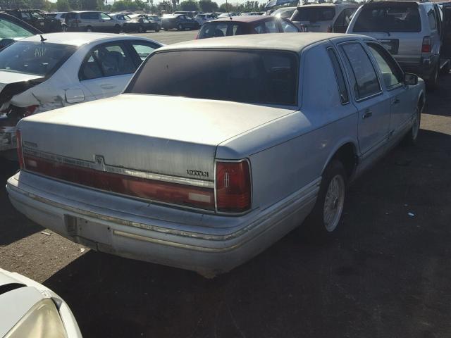 1LNCM83W8MY605287 - 1991 LINCOLN TOWN CAR C BLUE photo 4